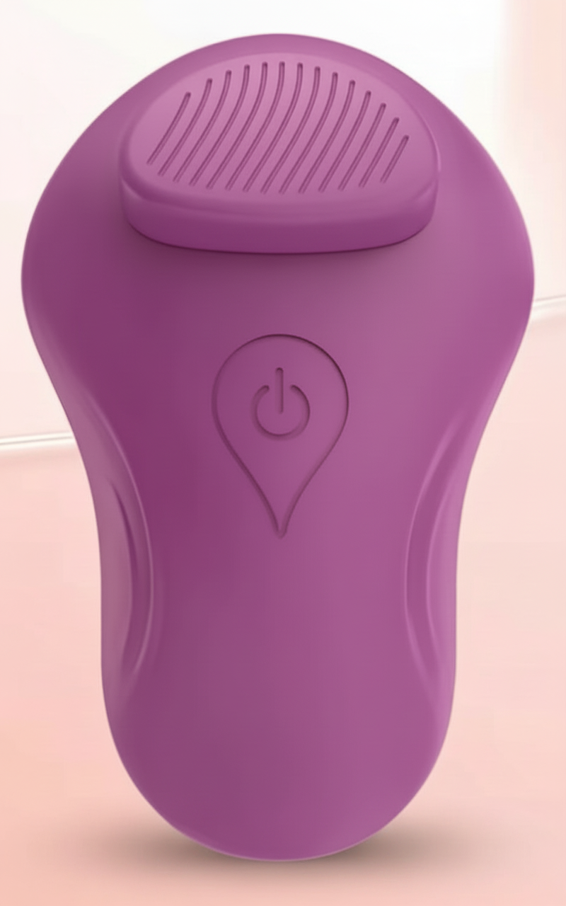 Close-up view of Quiet Pulse wearable wellness massager in purple colour, highlighting the soft silicone texture, ergonomic form, and minimalist control button
